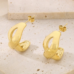 Minimalist 18k gold plated stainless steel infinity C-shape earrings on stone surface