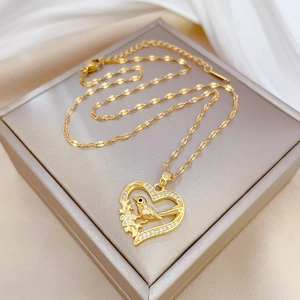 Luxury titanium steel heart necklace with crystal bird pendant and golden chain links