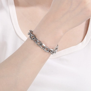 Minimalist silver stainless steel chunky chain bracelet on woman's wrist