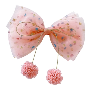 Pink mesh bow hair clip with colorful sequins and plush ball pendants for girls