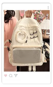 Detail of beige nylon backpack with transparent window and mesh pocket in home setting