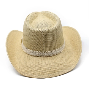 Detail showing the natural straw weave and white lace ribbon on the cowboy sun hat