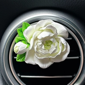 White jasmine flower car vent clip diffuser ornament with green leaves and buds