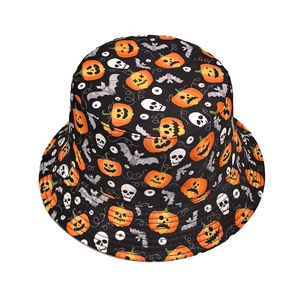 Halloween bucket hat with orange pumpkin and white skull prints on black fabric
