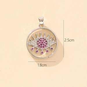 Detail view of evil eye pendant with purple zircon showing dimensions 2.5cm by 1.8cm