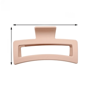 Detail view of large matte pink rectangle hair claw clip with size and weight specs