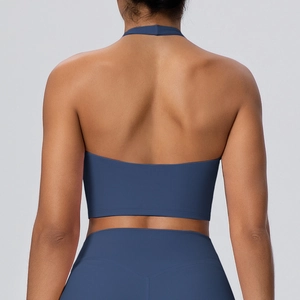Vista posteriore del reggiseno sportivo yoga blu scuro con scollo all'americana e schiena nuda