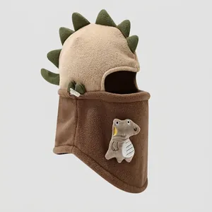 Detailed view of kids dinosaur fleece hat with soft ear flaps and cozy neck protection