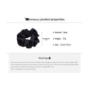 Detailed product dimensions for the blue polka dot fabric scrunchie, 17cm by 17cm