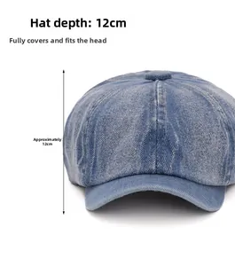 Detailed view of light blue washed denim newsboy cap showing 12cm depth measurement