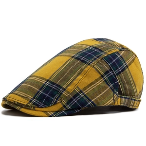 Classic plaid flat cap in yellow and green tartan pattern with adjustable metal buckle