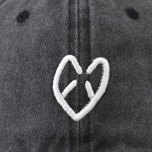Grey washed cotton baseball cap with white embroidered heart and letter design