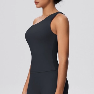 Close-up of asymmetrical one-shoulder black yoga vest with high-elasticity shaping fabric