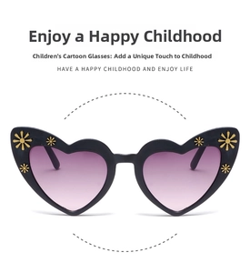 Detail of heart-shaped kids sunglasses with daisy decor and gradient lenses