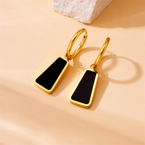 Modern gold-plated stainless steel earrings with geometric black trapezoid pendant