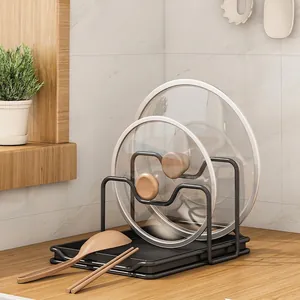 Black metal kitchen organizer stand for pot lids and cutting boards with drip tray