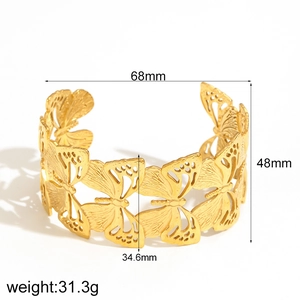 Detailed view of hollow butterfly gold cuff bracelet with dimensions 68mm and 31.3g weight