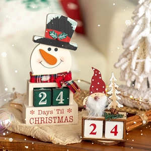 Wooden snowman and Santa countdown calendar with festive blocks for Christmas decor