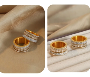 Detail shot of golden wide band ring with cubic zirconia and size 8 engraving inside