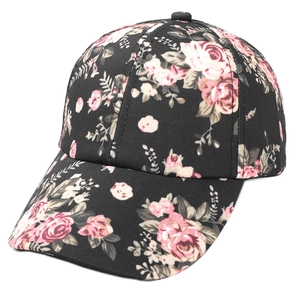 Black floral baseball cap with pink rose pattern and curved brim, 45-degree angle view