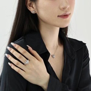 Detailed close-up of S925 sterling silver heart-shaped ring set with zircon stones