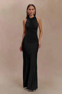 Detail of the elegant ruched bodice and high neck design on this black sleeveless maxi dress