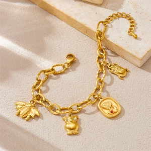 Gold 18K plated stainless steel charm bracelet with bee, owl, rose and beetle pendants