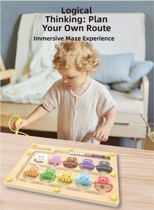 Toddler using magnetic stylus for color sorting and counting on wooden maze board