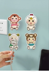 Practical wall-mounted cord organizers featuring four cute cartoon animal plug hooks
