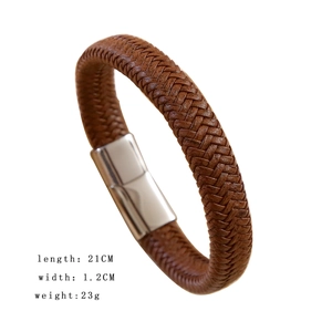 Detail view of brown braided leather bracelet with 21cm length and silver magnetic clasp