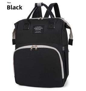 Close-up of durable black oxford fabric backpack with functional front zipper and label