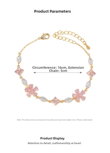 Detail of gold bracelet with pink and white zircon petals, 16cm length and 5cm extension