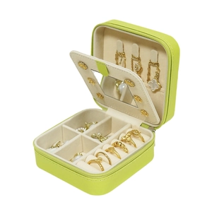 Portable mini jewelry box in green leather with mirror for rings and necklaces