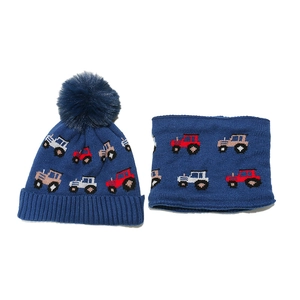 Winter kids knit set with blue beanie and neck warmer featuring a red tractor pattern