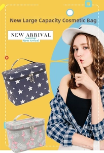 Waterproof travel cosmetic bag with star and flamingo patterns and handle grip