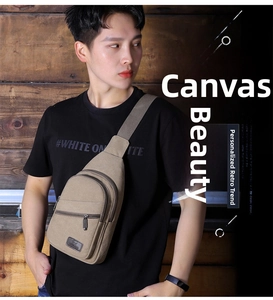 Detail view of khaki canvas sling bag with multiple zip pockets and adjustable strap