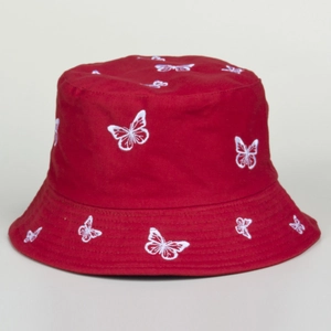 Red cotton bucket hat with white butterfly embroidery details and casual sun protection style