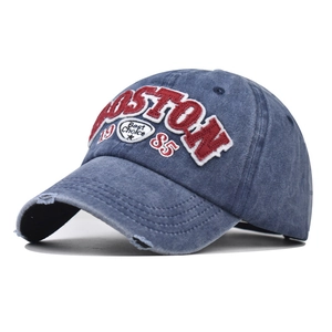 Close-up of 3D Boston embroidery and vintage distressed details on washed cotton cap