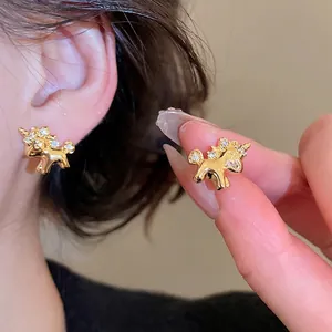 Luxurious gold plated unicorn stud earrings with sparkling cubic zirconia for women