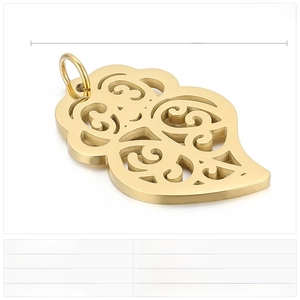 Detail view of gold leaf pendant with size 35x23mm and stainless steel specifications