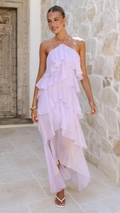 Detailed view of layered lavender chiffon ruffles on a halter neck long dress