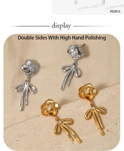 Detailed close-up of camellia flower and bowknot tassel earrings in gold and silver finish
