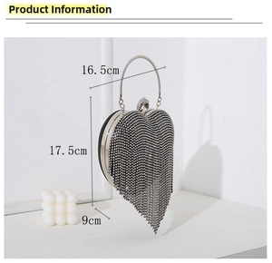 Detail showing heart-shaped rhinestone evening bag with silver tassels and dimensions