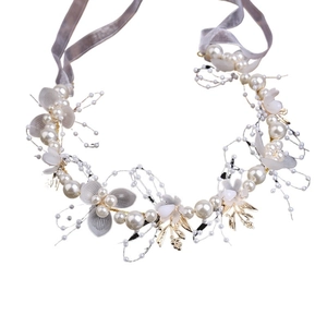 Golden leaf wedding hair vine with white pearls and floral fabric petals for bridal hairstyle