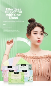 Detail of portable facial oil blotting papers in assorted scents like green tea and lavender
