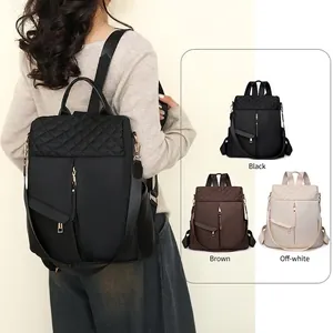 Quilted nylon backpack for women in black, brown, and off-white colors with adjustable straps