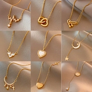 Detailed grid of nine minimalist gold necklaces with various elegant pendant charms