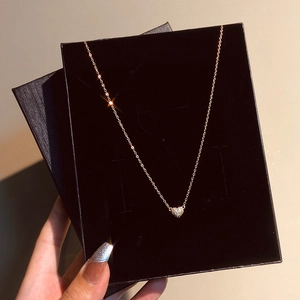 Elegant gold-plated heart necklace with pavé diamonds in a black jewelry gift box