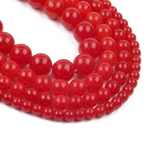 Detailed macro view of red chalcedony beads with natural ice crack textures
