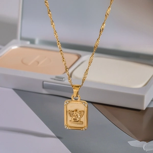Gold angel relief rectangle necklace in stainless steel with tiny white zircon accents